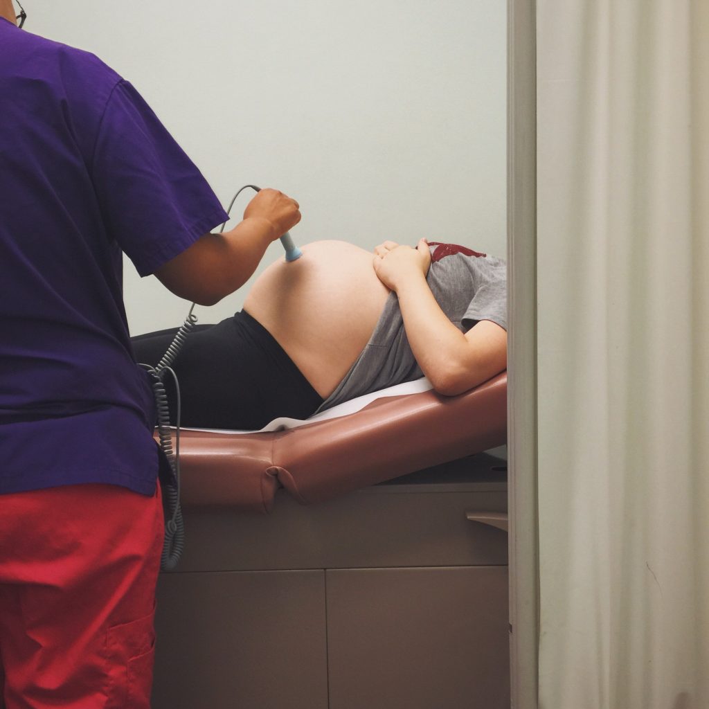 Last trimester dr visit for pregnant woman